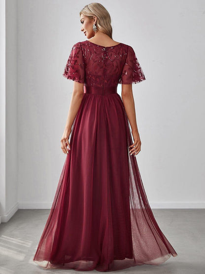 Robe longue de cérémonie à manches courtes avec broderie