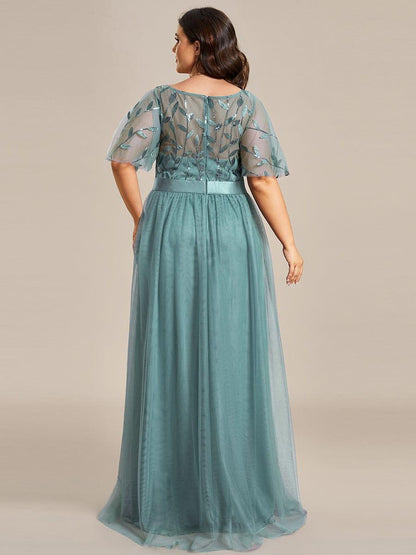 Robe longue de cérémonie à manches courtes avec broderie