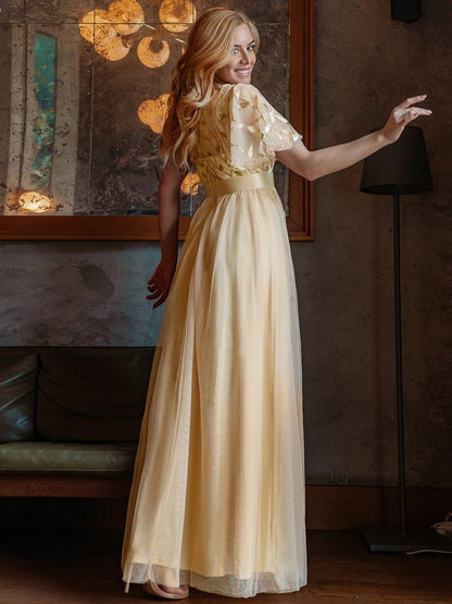 Robe longue de cérémonie à manches courtes avec broderie